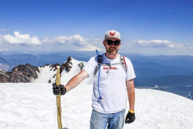 Reporter Eric Schwartz stands at the summit of Mount St. Helens Tuesday. Photo by Eric Schwartz
