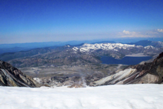 Steam rises from the crater of Mount St. Helens as Spirit Lake is seen in the background at the summit of Mount St. Helens Steam rises from the crater of Mount St. Helens as Spirit Lake is seen in the background at the summit of Mount St. Helens. Photo by Eric Schwartz