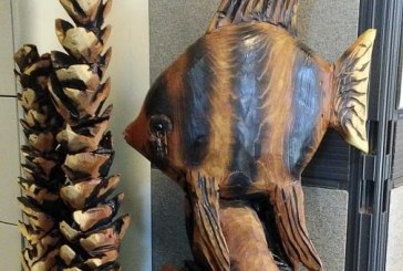 Area artist donates carving to raise critical summer funder for food bank