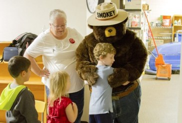Smokey the Bear teaches Woodland Primary Schools students how to prevent forest fires