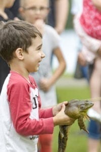 The 51st annual Frog Jumping Contest will take place Saturday at 1:30 p.m. The event is a favorite among children each year at Woodland’s Planters Days. Photo by Mike Schultz