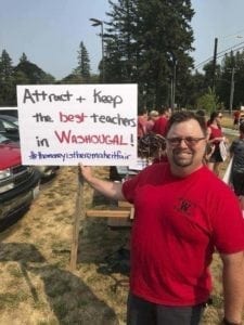 A Washougal teacher holds a sign at a recent rally in support of raises for teachers. Photo courtesy Washougal Education Association
