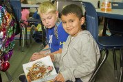 Book Buddies at Woodland Intermediate School work together to improve reading skills