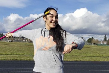 Olympian encourages Heritage athlete to soar with javelin