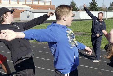 Experts give advice at Heritage HS during throwers clinic