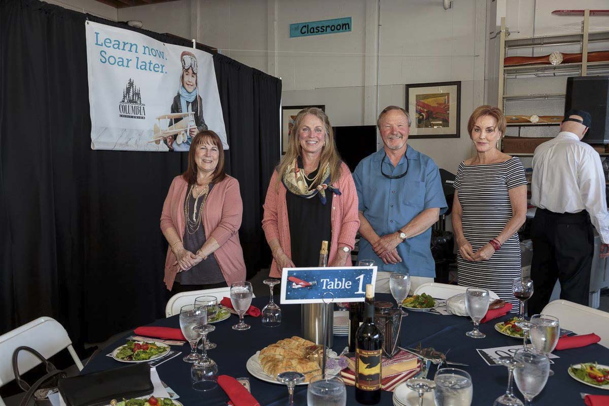 Dennis Kozacek (center) pictured at an event at Pearson Air Museum in 2017. Also pictured, from left to right, Sue Metzger, Laurel Stephens-Kozacek, Anita Atina. Photo via Facebook