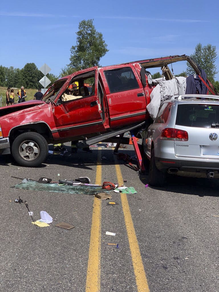 Vehicle crash with extrication and downed power lines occurs on NW