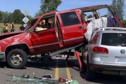 Vehicle crash with extrication and downed power lines occurs on NW Lower River Road