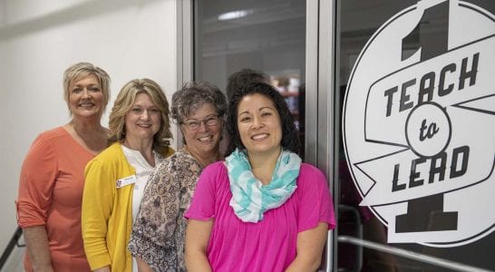 From left to right, Teach One to Lead One staff members are shown here: Tamara Kerr, program director; Teresa Lutz, executive director; Brenda McGinnis, mentor and school coordinator; Rachel Adams-Kelly, communications specialist. Photo by Jacob Granneman