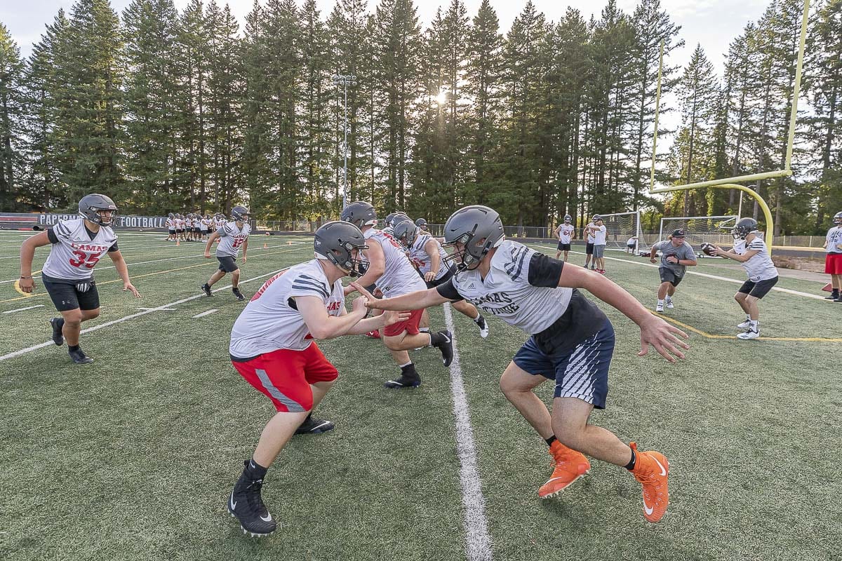 The Papermakers look cool, practicing in the shade. Camas, which has finished second in the 4A GSHL the past two seasons, is hoping to return to the top of the league this year. Photo by Mike Schultz