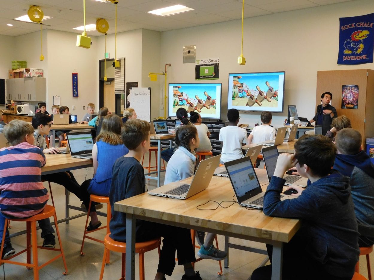 Sunset Ridge Intermediate School teacher, Nam Nguyen, shows fifth graders the dance animation sequence during a programming assignment in his computer science class. Photo courtesy of Ridgefield Public Schools