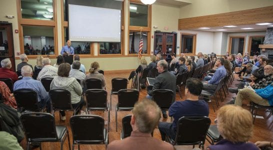 The evening was emceed by Camas School Board President Doug Quinn, who received questions from the crowd on comment slips and lead a Q&A with speakers. Photo by Jacob Granneman
