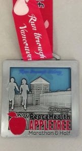 In addition to the fun and challenge of running, participants receive a bounty of swag including, a race medal, a Finishers’ shirt, and a delicious meal and beverages. Photo courtesy of PeaceHealth
