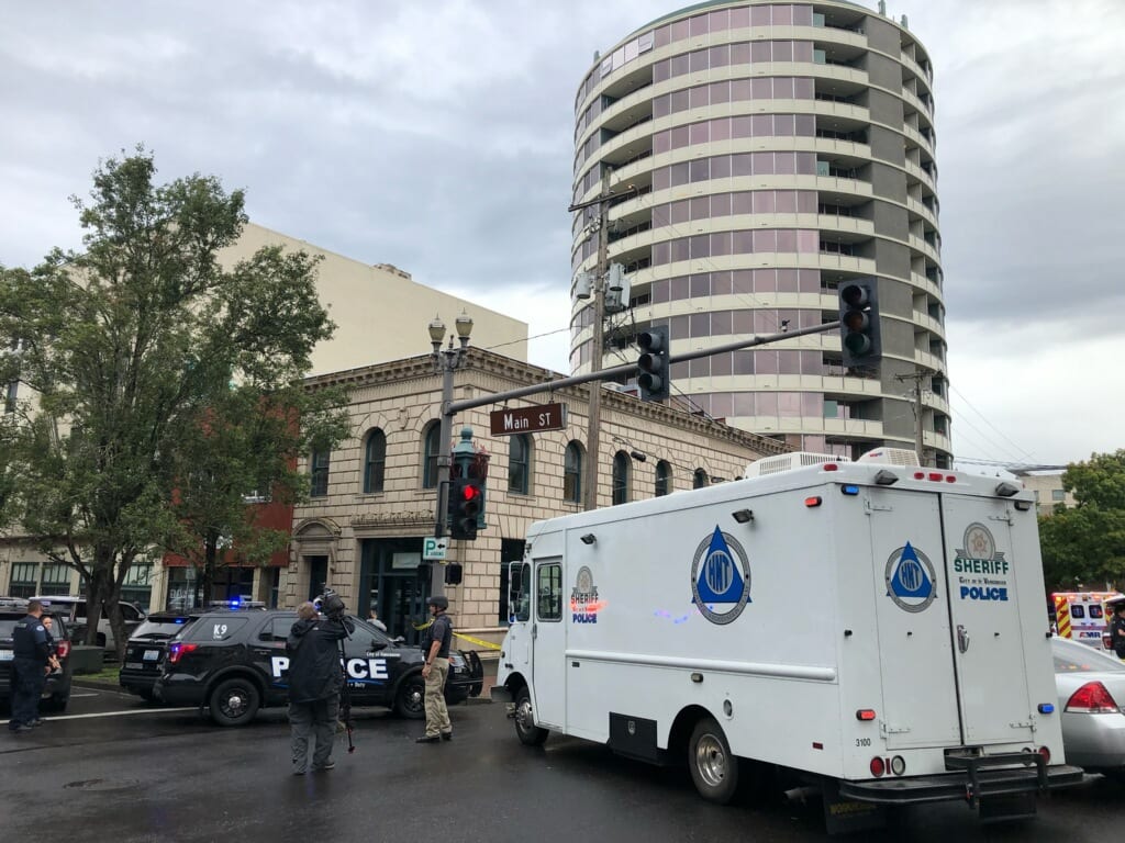 SWAT officers stage near the Smith Tower in downtown Vancouver after a shooting inside on Thursday afternoon. Photo by Mike Schultz