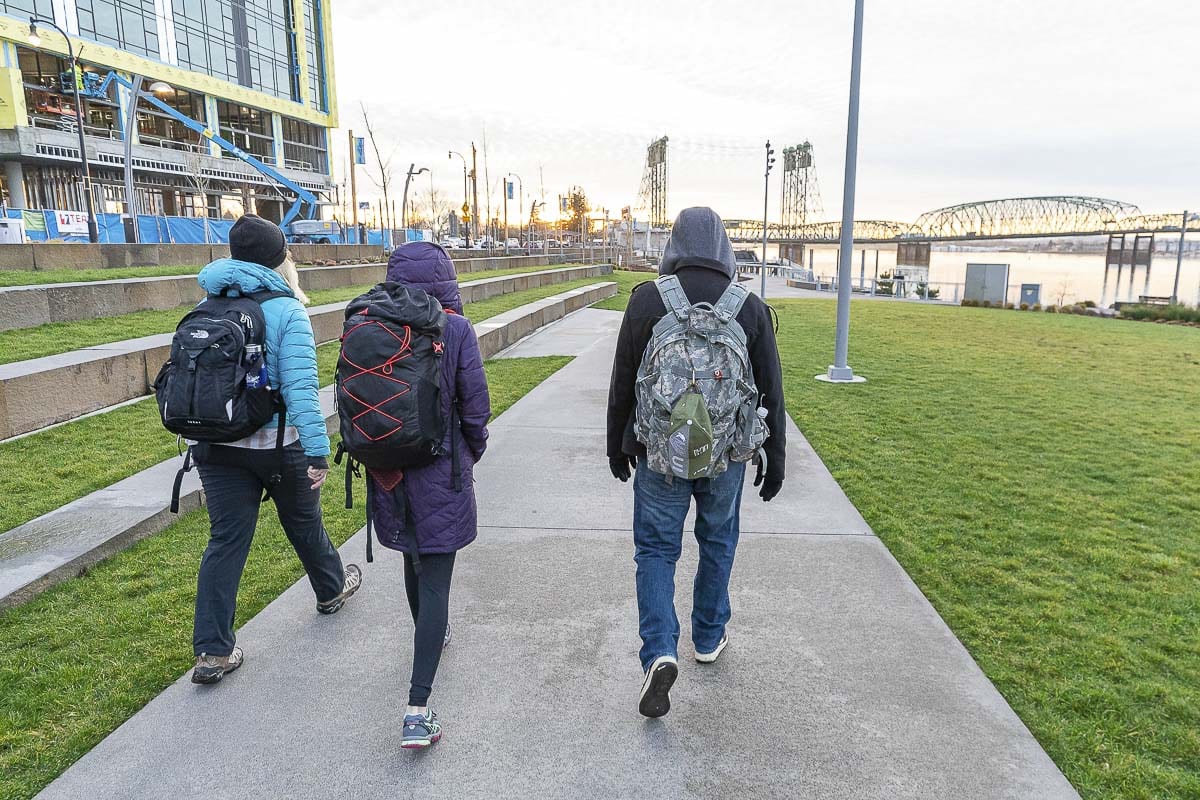 Ashley Gaffney, Sara De La Torre, and Brian Coleman walk along the Vancouver Waterfront during the annual Homeless Point in Time count on Thursday. Photo by Mike Schultz