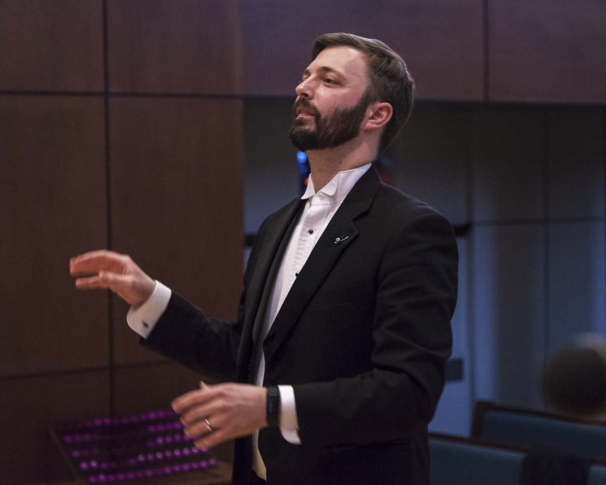 Dr. Jacob Funk directs the Clark College choirs. Photo courtesy of Clark College