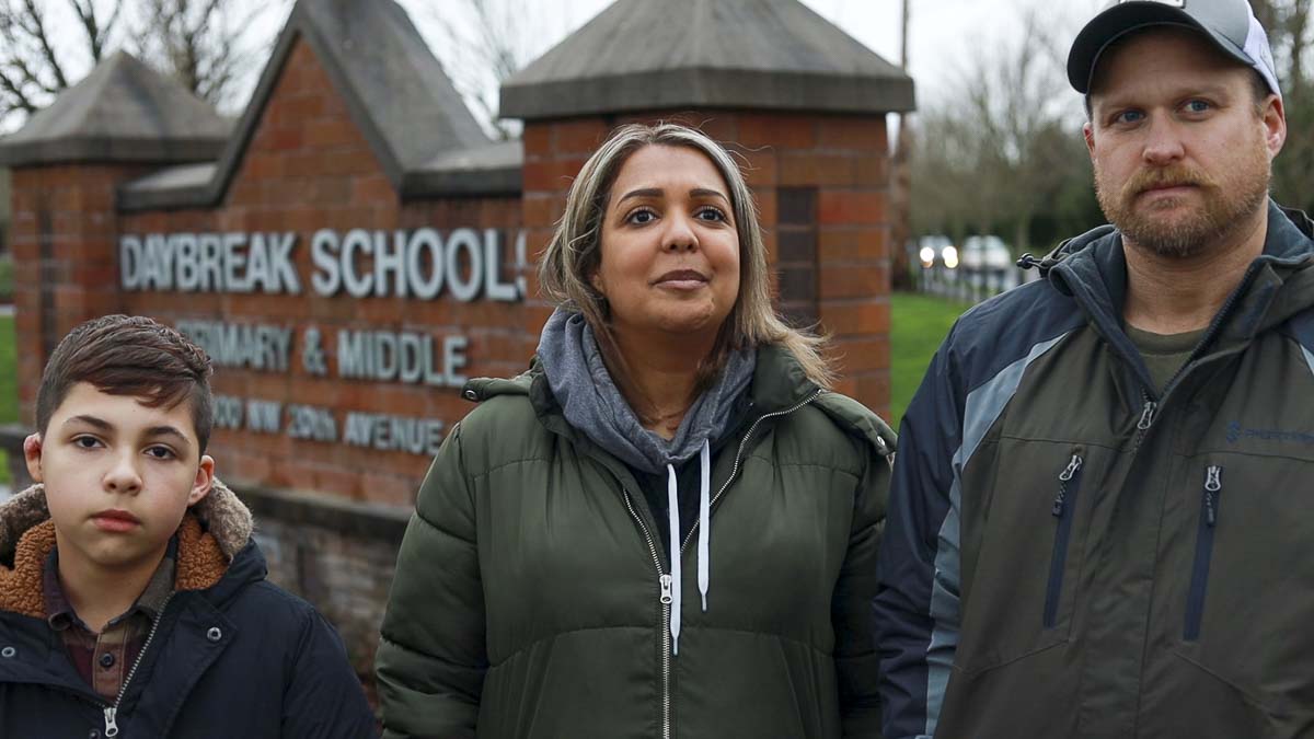 Karah Jordan (center) says her son Kelan was attacked by another student at Daybreak School in Battle Ground, then she says the district fell short of protecting her son. Photo by Chris Brown