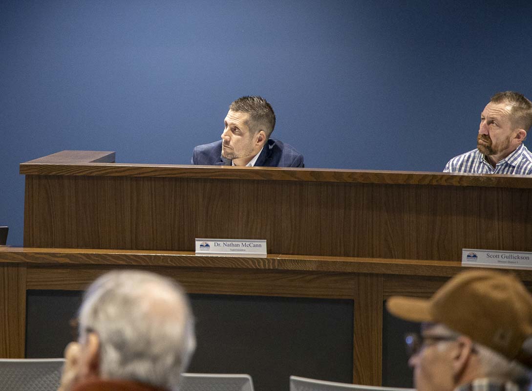Ridgefield School District Superintendent Nathan McCann listens to a presentation during a meeting of the school board on Tuesday. Photo by Chris Brown