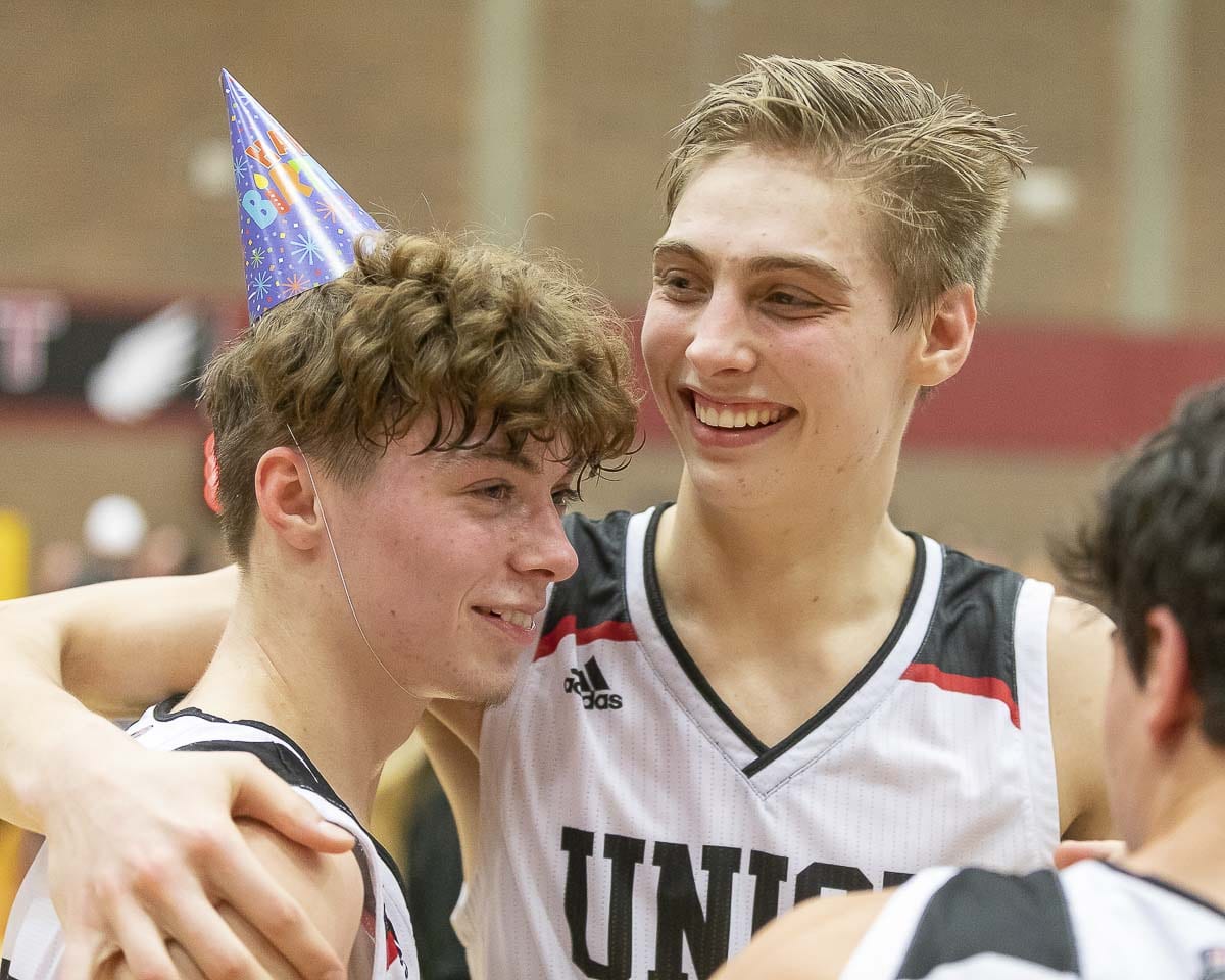 Kaden Horn (left) and Tanner Toolson have had a lot to celebrate so far this season. Horn is an all-leaguer, and Toolson is the 4A GSHL Player of the Year. Union plays Gonzaga Prep in a state regional game Saturday at Battle Ground High School. Photo by Mike Schultz