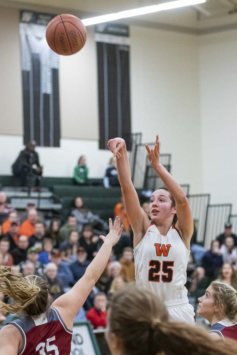 Washougal’s McKinley Stotts (11) and Savea Mansfield provide the defensive pressure against W.F. West on Monday. Washougal’s defense was solid for most of the night but the offense struggled in a loss in the district semifinals. Photo by Mike Schultz