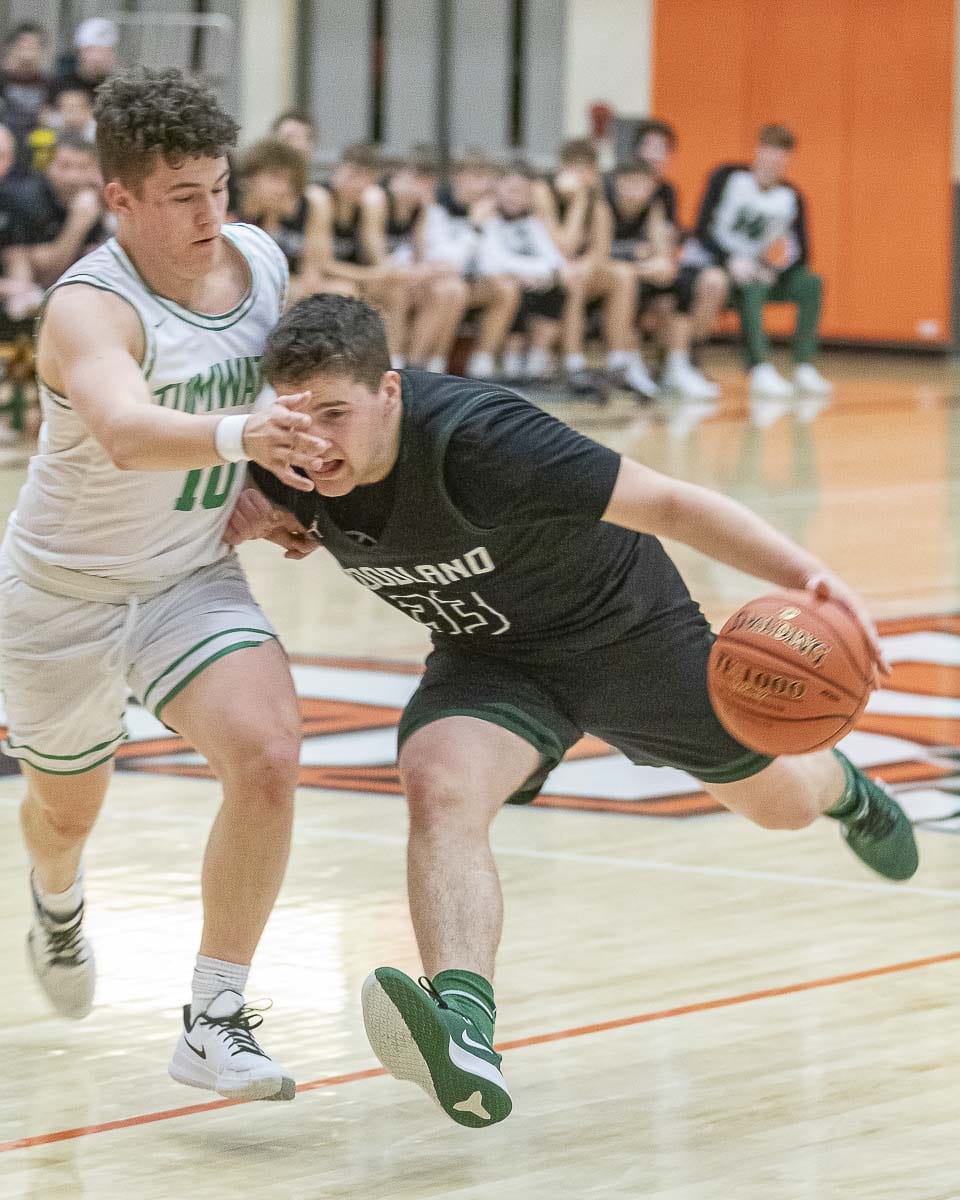 Trey Hanson and the Woodland Beavers had a tough task Friday in the district championship game, falling to Tuwmater. But the Beavers are going to state, and that is a story in itself. Photo by Mike Schultz