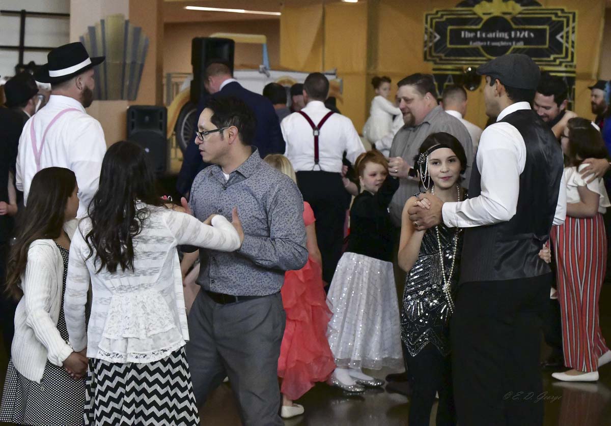 A searchlight in the parking lot and the red carpet welcomed over 500 attendees to the early ball and 700 to the late ball. Photo courtesy of Grace Community Church
