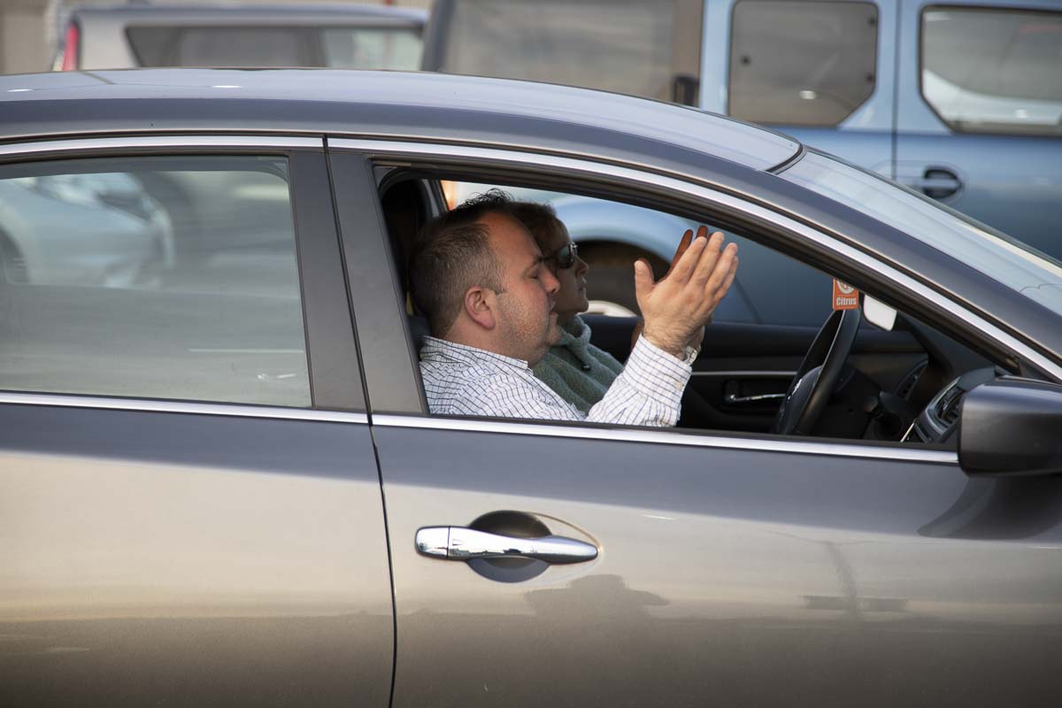 People worship in their cars during the church’s first drive-in service on Tue., March 17. Photo courtesy of Living Hope Church