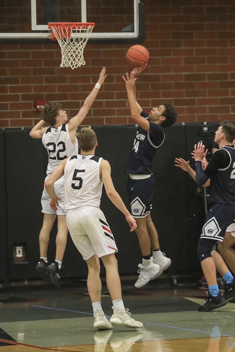 Jace Chatman, shown here earlier this season, had a strong overall game with 22 points, five rebounds, three assists, and a couple of steals to help Skyview advance to the Class 4A state boys basketball quarterfinals. Photo by Mike Schultz