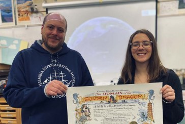 Mini-boat students receive Navy certificate after their vessel crosses international dateline