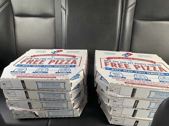 Pizzas from Domino’s in Battle Ground are ready for delivery to Kaiser Permanente and DaVita. Photo courtesy Jevon Domench - Academy Mortgage.