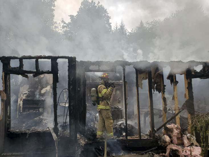 Clark County Fire & Rescue firefighters extinguished a fire involving a manufactured home north of La Center Friday afternoon. Photo courtesy of Clark County Fire & Rescue