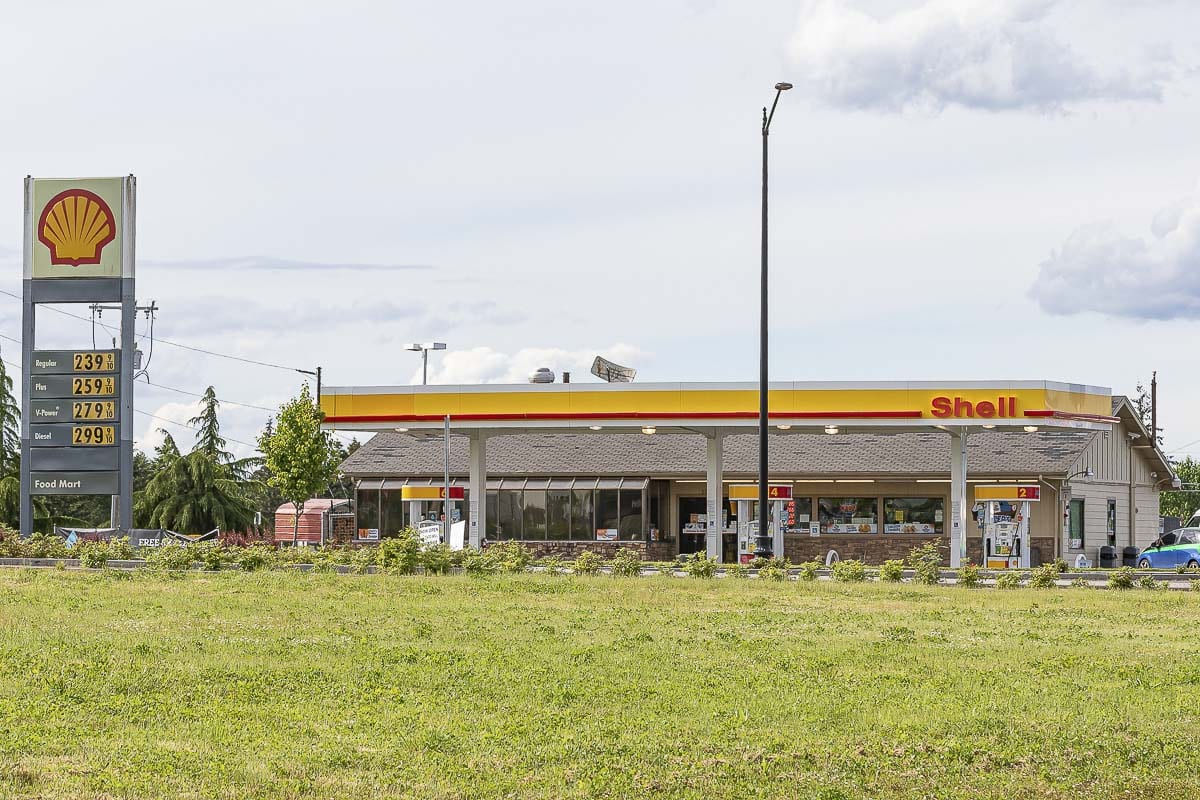 The proposed Minit Management Redevelopment Project would be at the site of the Shell gas station and market located on the east side of the La Center I-5 interchange. The proposed project is a phased commercial development that includes a 101-unit, five-story hotel; a multi-tenant commercial building; a convenience store; a drive-through restaurant and a 12-pump gas station. Photo by Mike Schultz