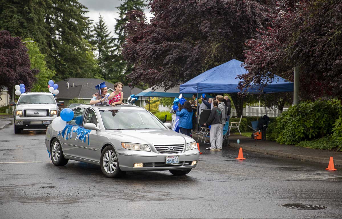 LCHS seniors decorated their cars and wore their caps to drive through the city on a route lined with cheering fans. Photo by Jacob Granneman