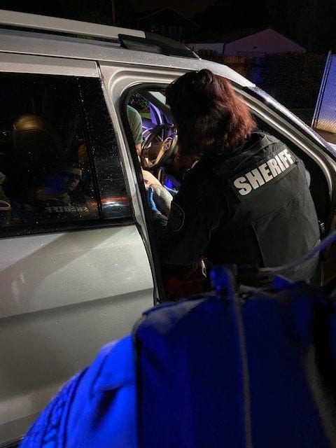 Clark County Sheriff's Deputy Melissa Sager offered assistance to a mother who successfully delivered a healthy baby boy Tuesday.  The mom gave birth in the front seat of the family's SUV.  Photo courtesy of Clark County Sheriff’s Department