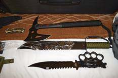 Detectives executed a search warrant at the suspect’s hotel room and located what appears to be a kidnappers kit which included heavy duty flex cuffs, handcuffs, duct tape, rubber gloves, face wrap/blindfold, lubricant, a sex toy, several large knives, a hatchet, and a .45 caliber handgun and ammunition. Photo courtesy of Vancouver Police Department