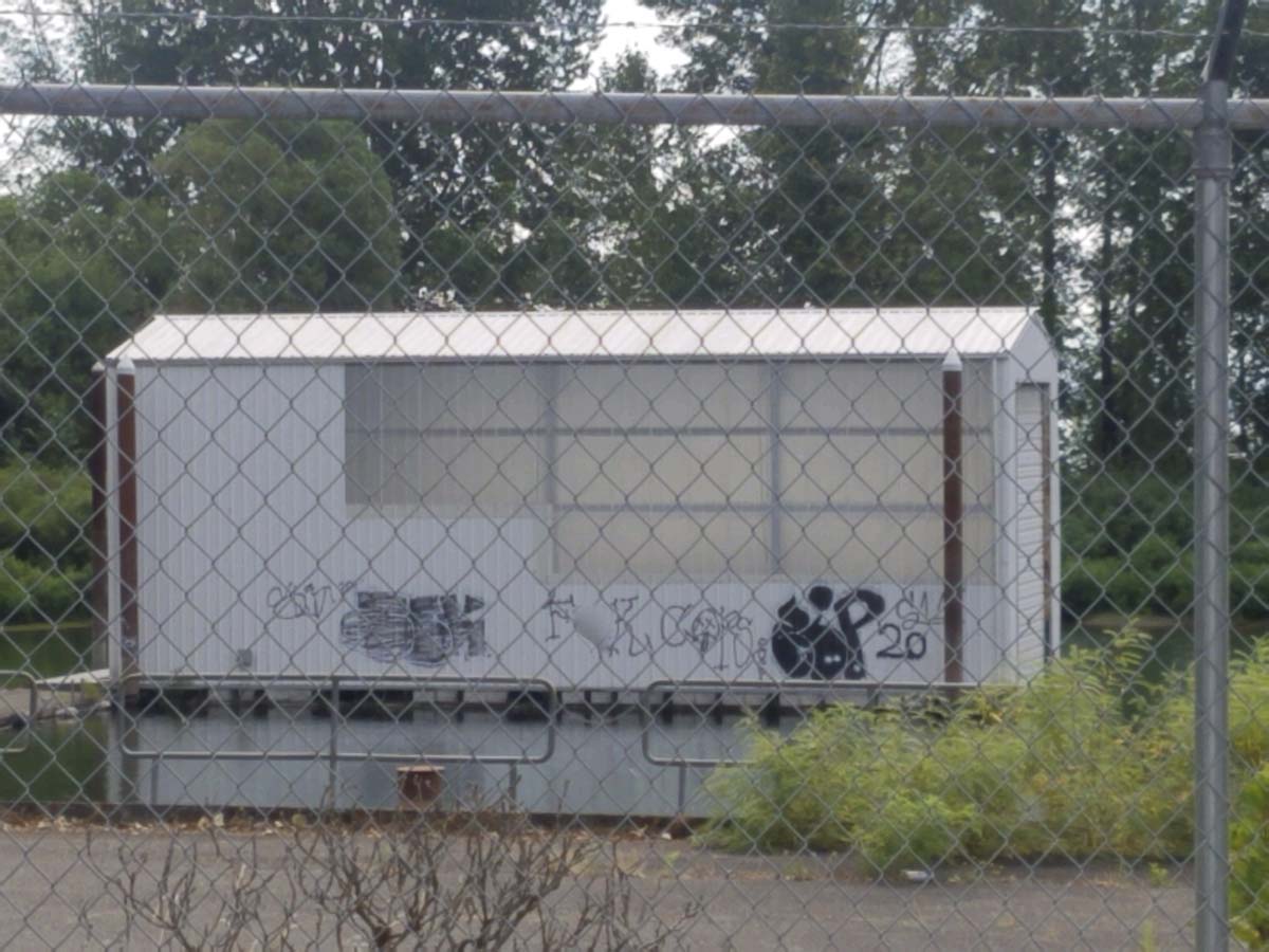 Vulgar graffiti painted along the side of the Vancouver Fire Department’s boat house can be seen here. Photo courtesy of Alex Schoening