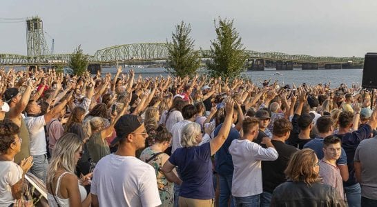 Worshipers came to Vancouver’s Waterfront Park on Friday to sing with Let Us Worship. Photo by Mike Schultz