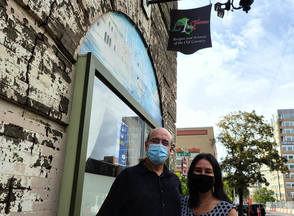Jeff and Teresa Boyer stand outside Little Italy’s Trattoria, one of 34 restaurants that will participate in Dine the Couve, a month-long celebration of restaurants in October. Photo by Paul Valencia