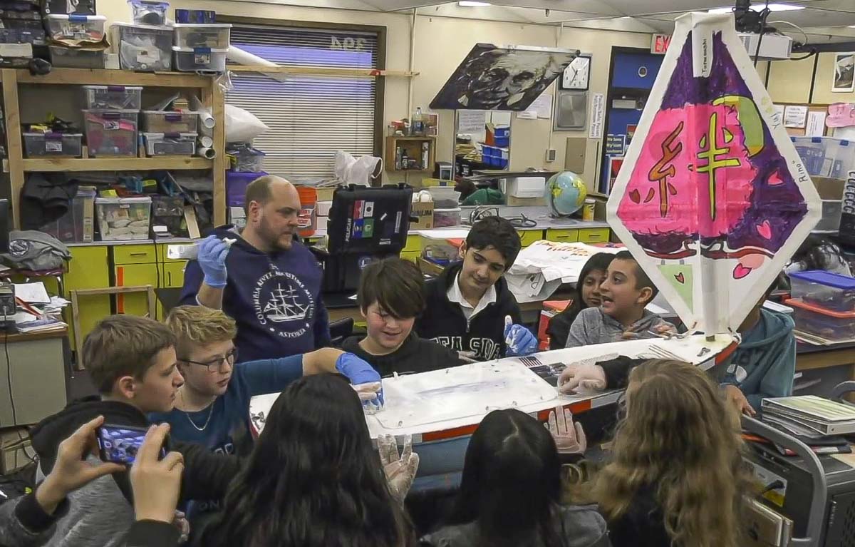 Nate Sandel (left back) is seen here back in 2019 working with students at Wy’east Middle School in Vancouver. Photo courtesy of CRMM