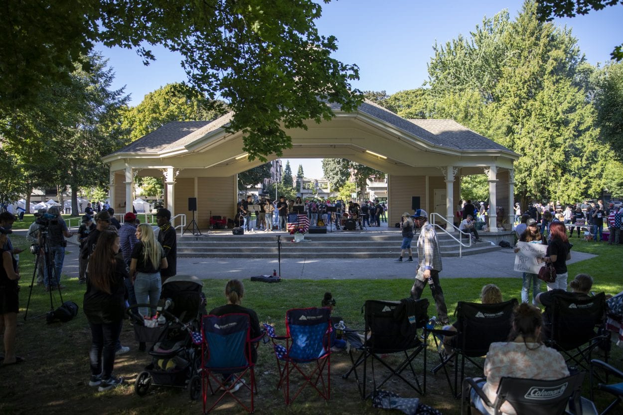 A large gathering of supporters of Patriot Prayer and Aaron J. Danielson met in Esther Short Park on Saturday to honor their friend who was murdered. Photo by Jacob Granneman