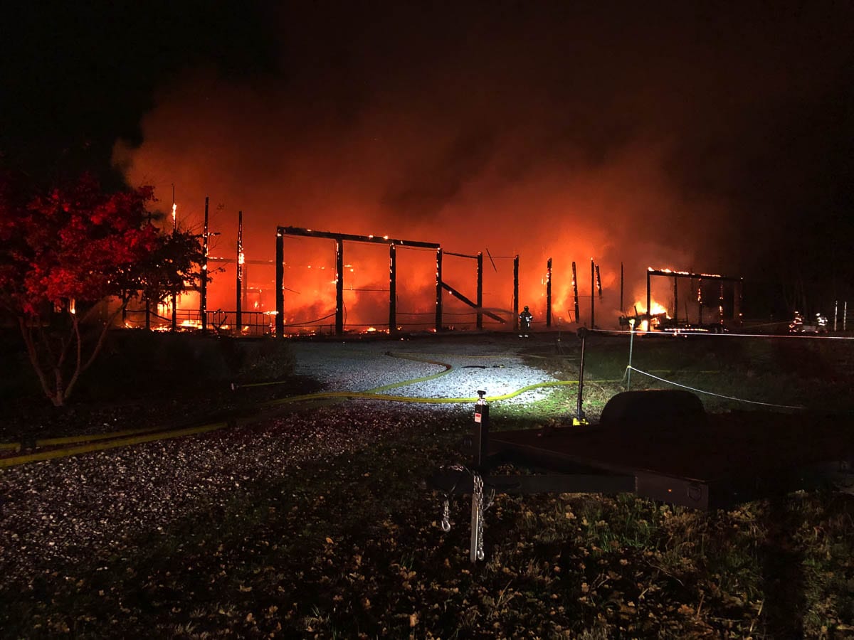 A large horse arena in the Meadow Glade neighborhood southwest of Battle Ground was destroyed by fire early Wednesday morning. Photo courtesy of Clark County Fire & Rescue