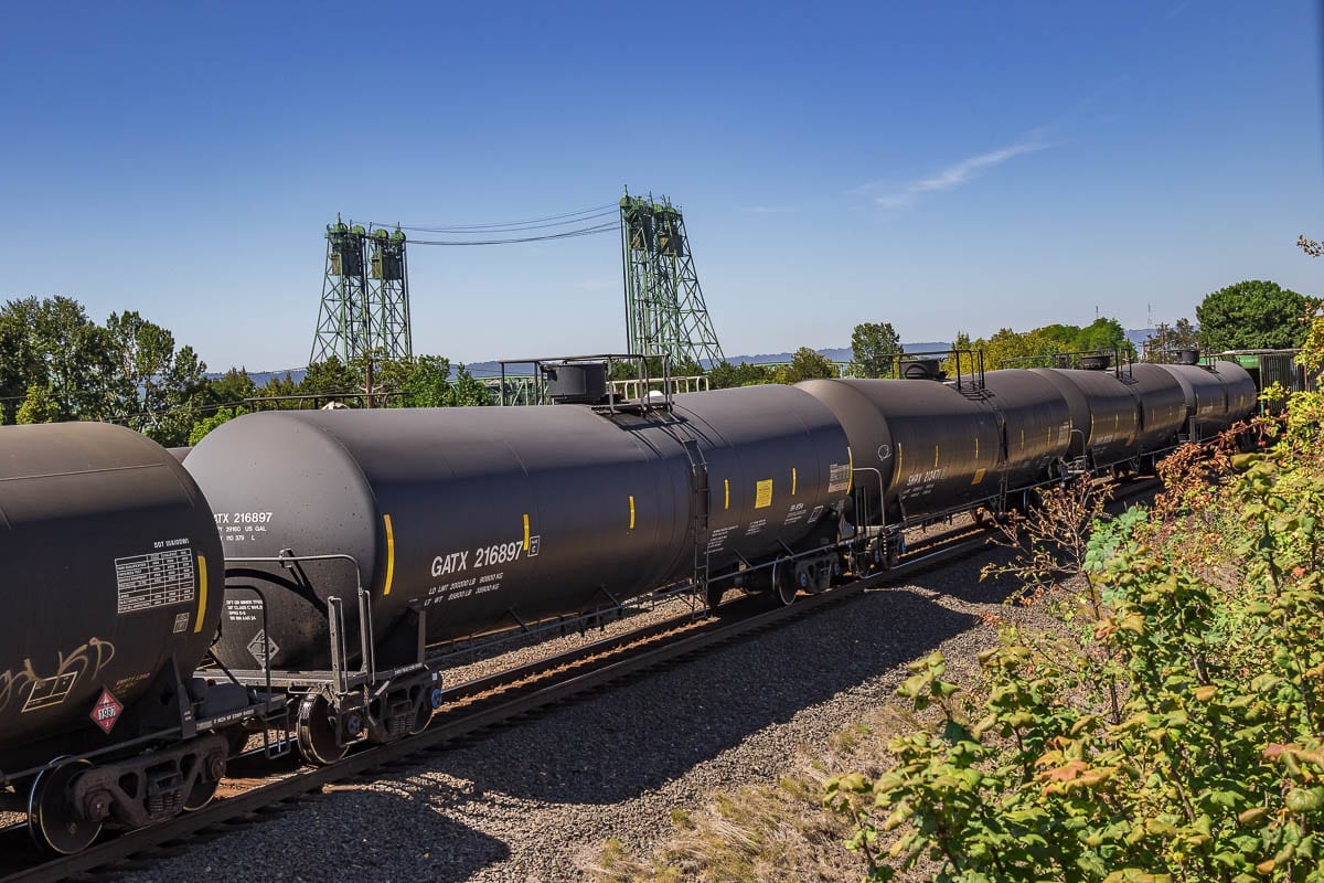 Oil-laden train cars along the tracks near the Port of Vancouver. Photo by Mike Schultz