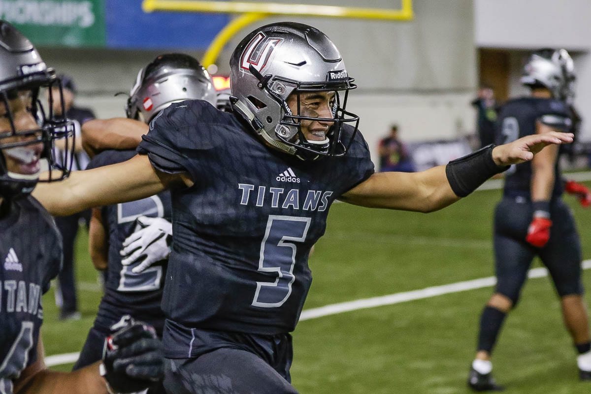 Lincoln Victor led the Union Titans to a perfect season and a Class 4A state championship in 2018. This week, he announced he is transferring from the University of Hawai’i. Photo by Mike Schultz