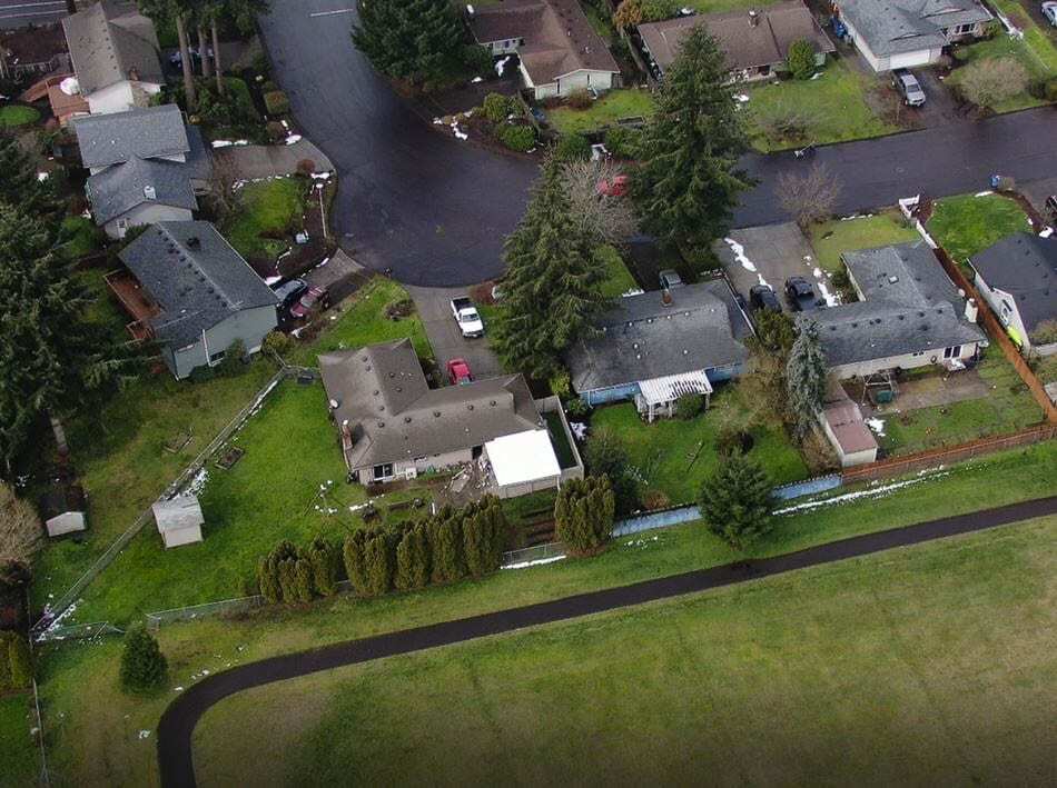 After coming to rest in the grass field, the suspect fled the vehicle into the neighborhood area of NE 10th Street and NE 100th Avenue. Photo courtesy of Clark County Sheriff’s Office