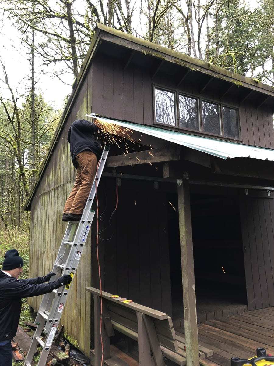 Together the Lions volunteered their skills in repair, metal working and construction to fix the damaged buildings at Camp Currie. Photo courtesy of Tyler Brown