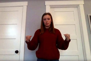 Woodland High School student taught a fourth-grade class how to use American Sign Language to sign the school's pledge