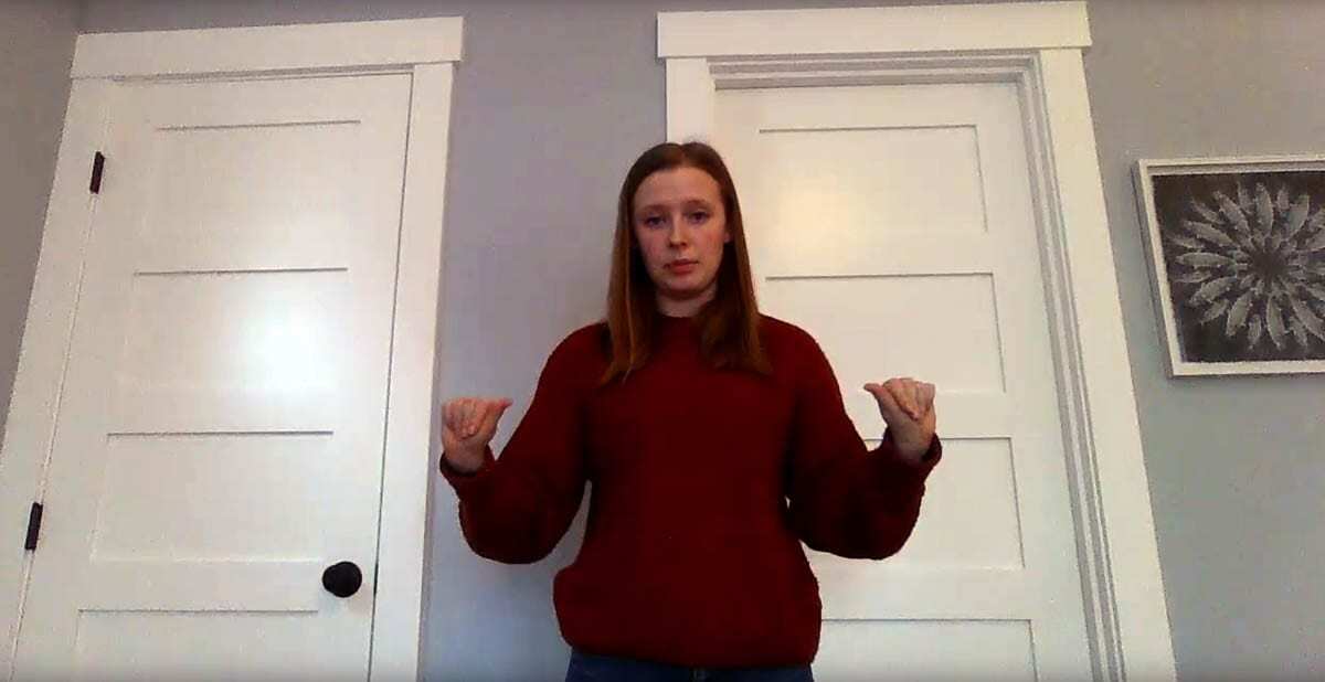 Jaylee Graham, a sophomore at Woodland High School, created a video to teach fourth graders how to sign the school pledge. Photo courtesy of Woodland School District