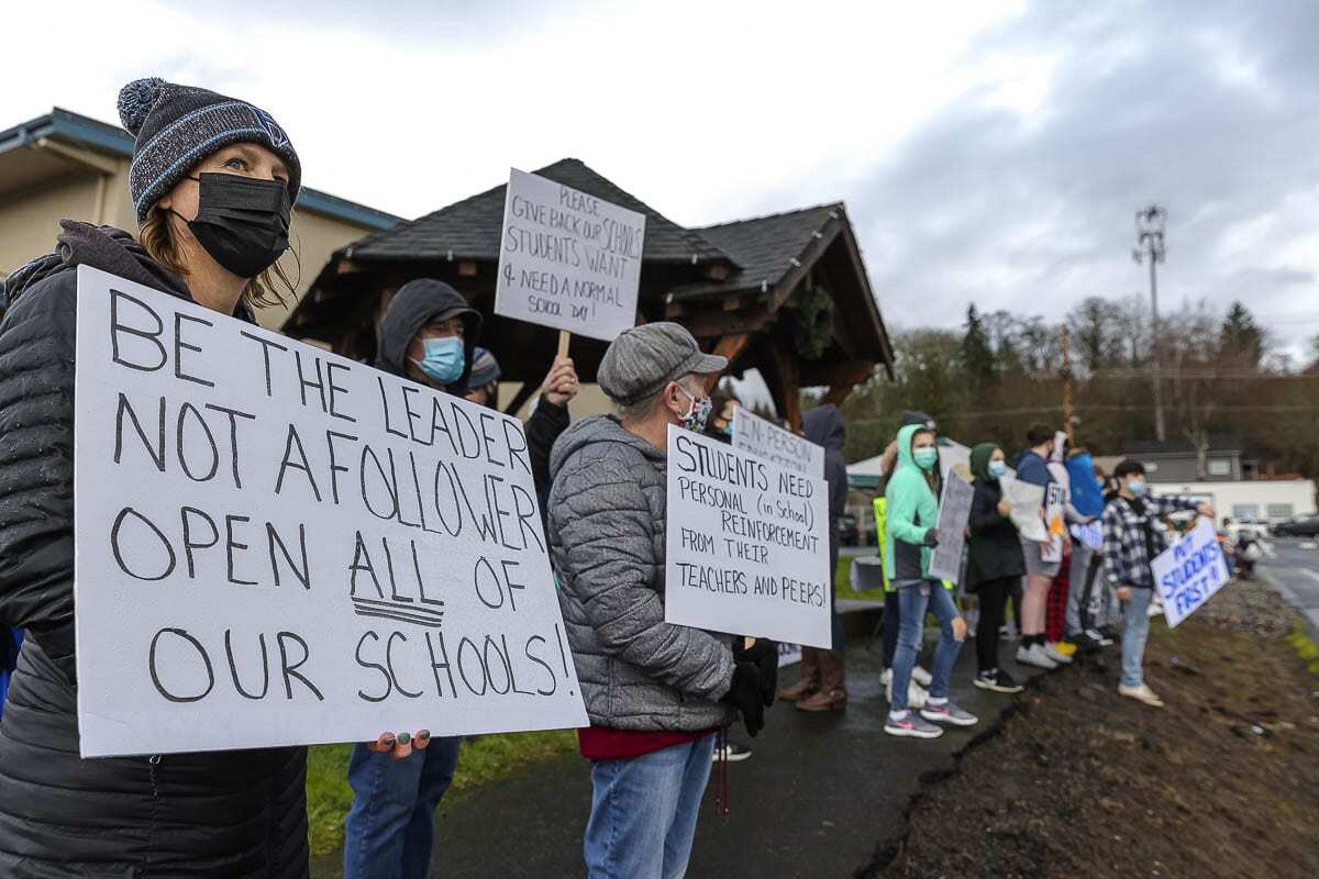 Kari Frings and other Hockinson School District parents rally for reopening schools last January. File Photo
