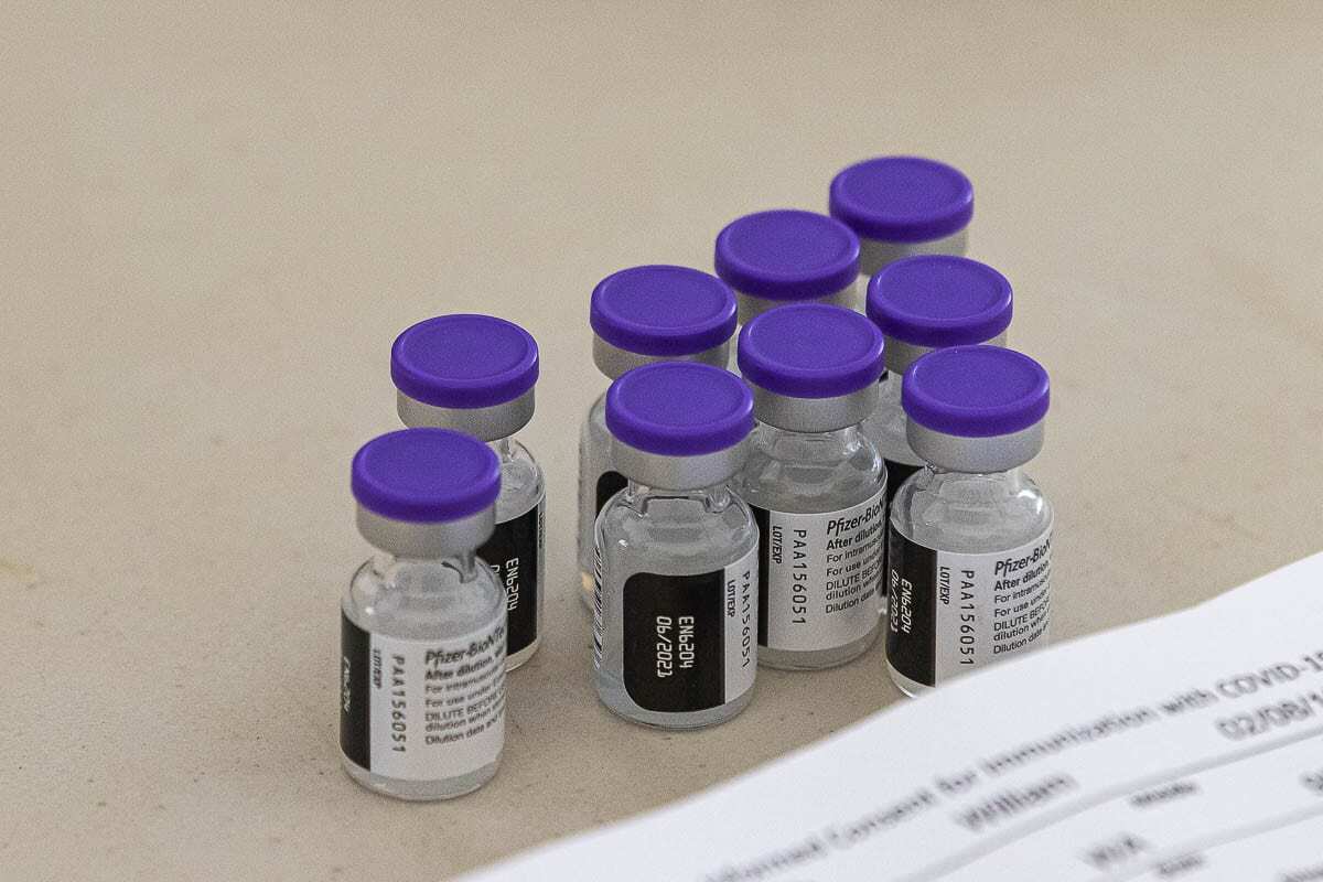 Bottles of Pfizer’s COVID-19 vaccine await arms at the Tower Mall community vaccination site in Vancouver. Photo by Mike Schultz