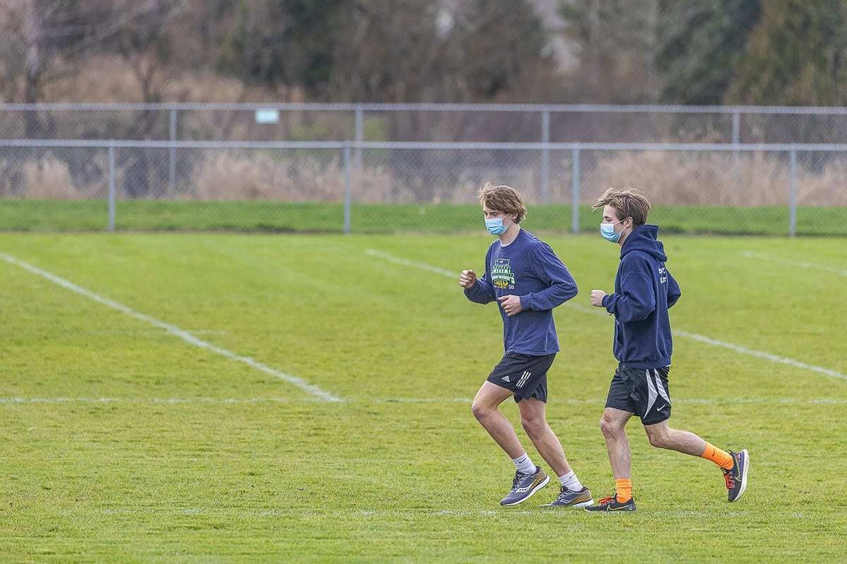 Trevan Bischoff is the Hockinson record holder in cross country, and Josh Saeman is right behind him. The two seniors and close friends will wrap up their high school cross country careers next week. Photo by Mike Schultz
